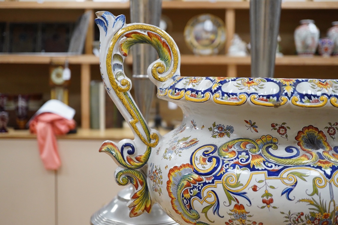 A large ornate two handled French faience planter, 39cm high